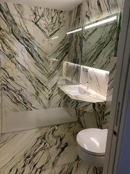 Bathroom clad from floor to ceiling