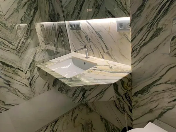 Bathroom clad from floor to ceiling
