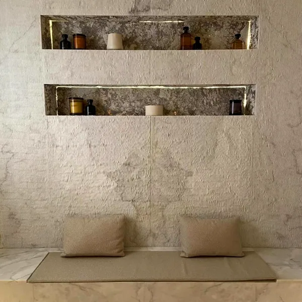 Wall with lit niches